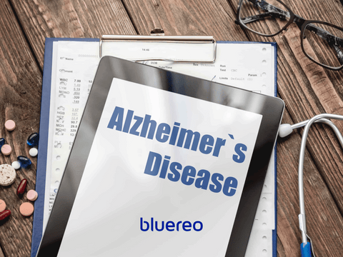A clipboard showing alzheimer's disease written on it, with information and data about swallowing difficulty behind it.