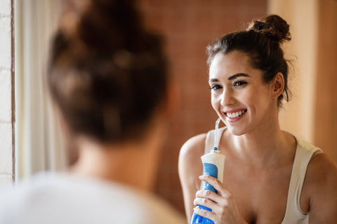 How to Use a Water Flosser the Right Way